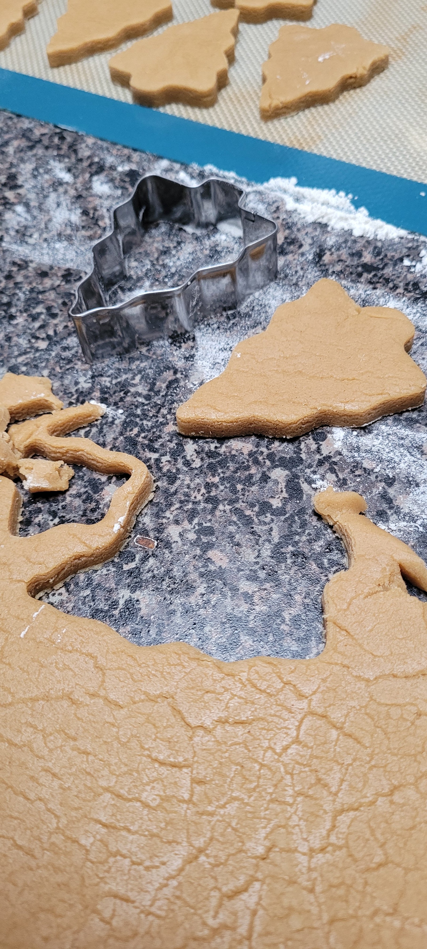 Cutting out Gingerbread people and gingerbread trees